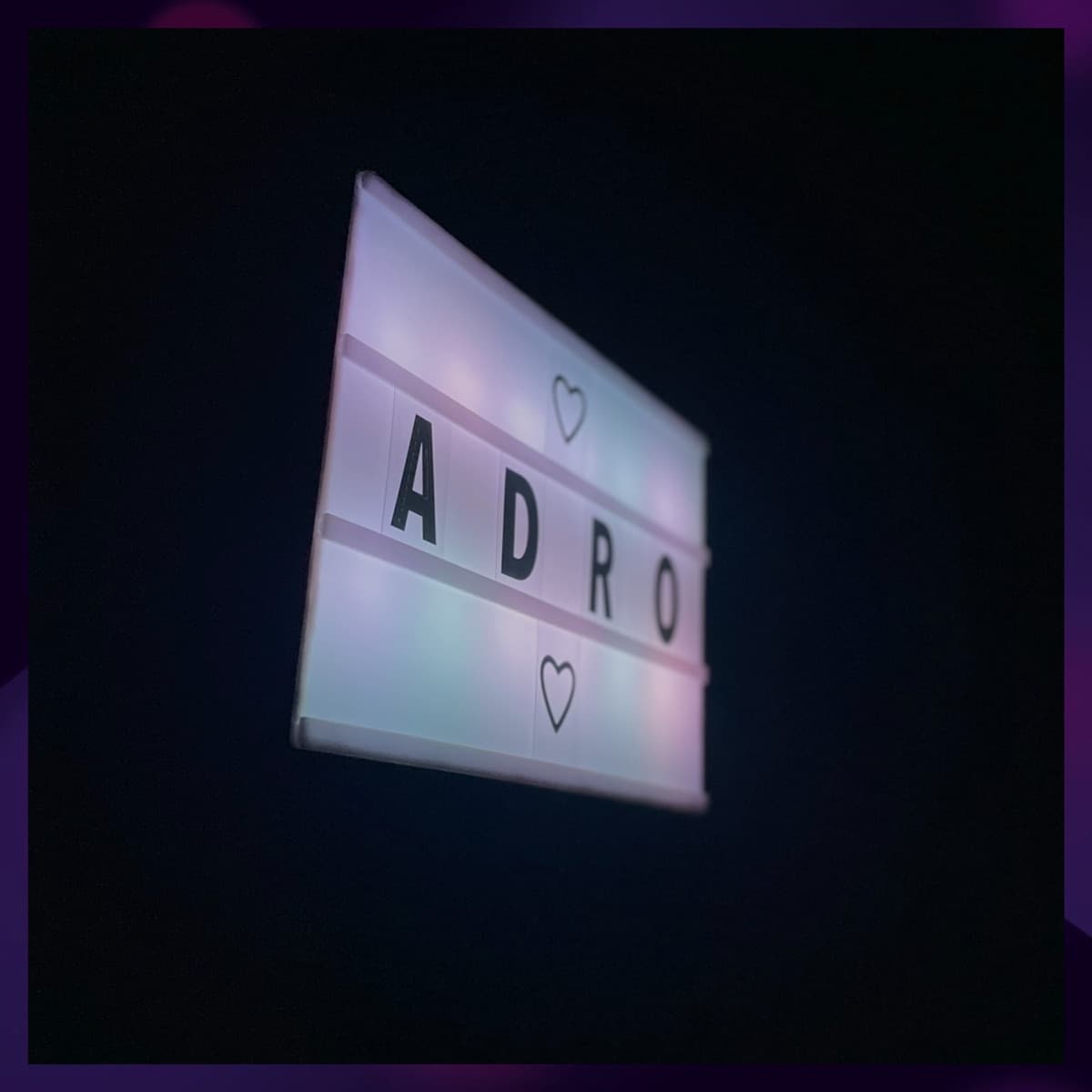 80631 cover: a lit letter board spelling ADRO in the dark