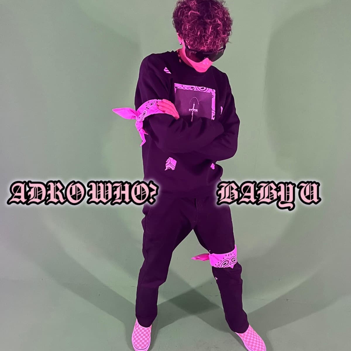 BABY U cover: ADRO WHO? in black with pink accents against a pale green wall